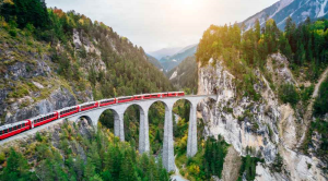 Slow training crossing bridge in Switzerland